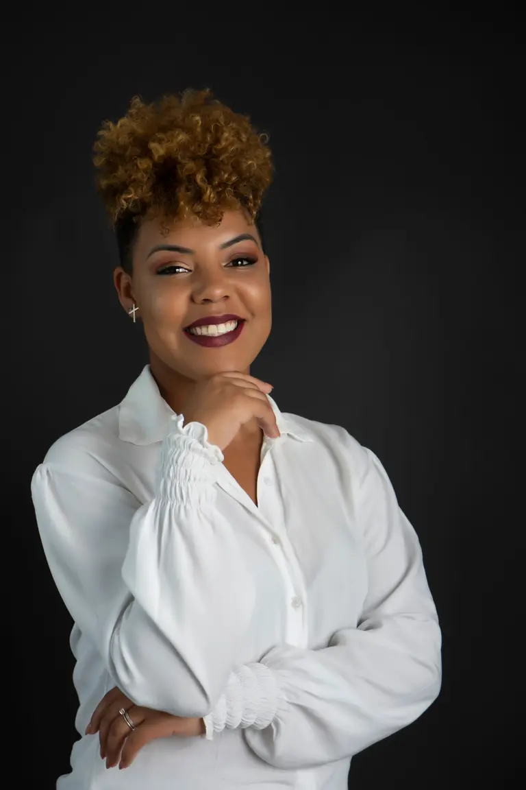 Portrait of Camila Duarte, a fictional reviewer (stock photo)